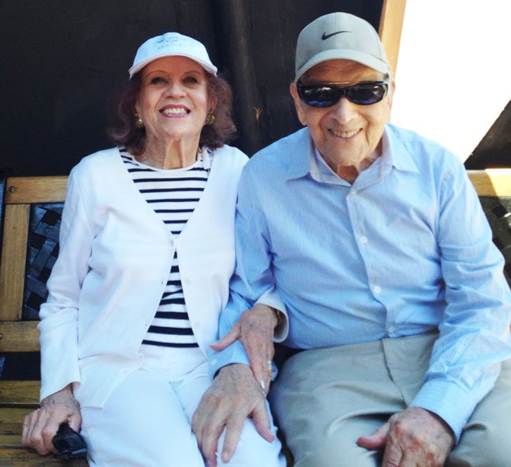 Esther and Robert Metzner with the sculpture "Convergence"